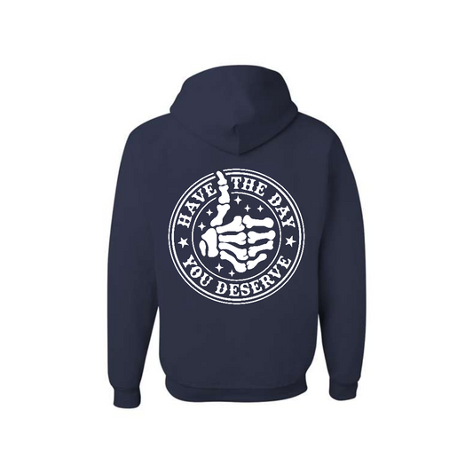 J. Navy Have the Day You Deserve graphic hoodie, back view showing the circular skeleton hand graphic.