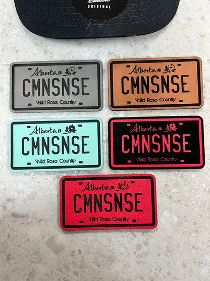 CMNSNSE Alberta Plate SnapBack Trucker