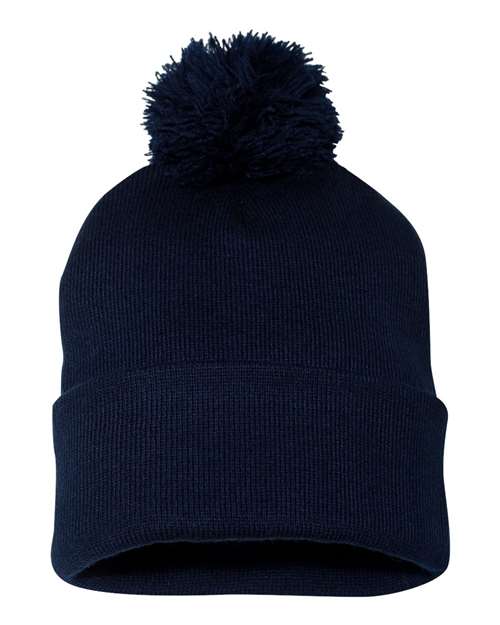 Navy blue beanie with a pom-pom on a white background