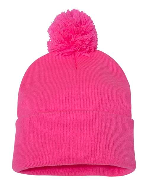 Neon Pink beanie with a pom-pom on a white background