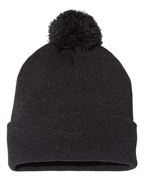 Black knit beanie with pom-pom on a white background