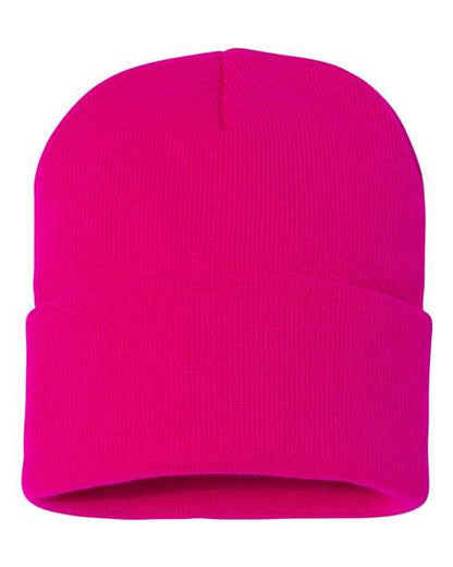 Bright pink beanie on a white background