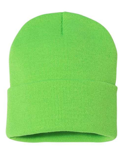 Green beanie hat on a white background
