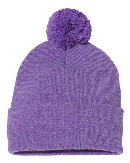 Purple knit beanie with a pom-pom on a white background