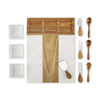 Marble and wood charcuterie board set arranged flat with cheese tools, dipping bowls and spoons.