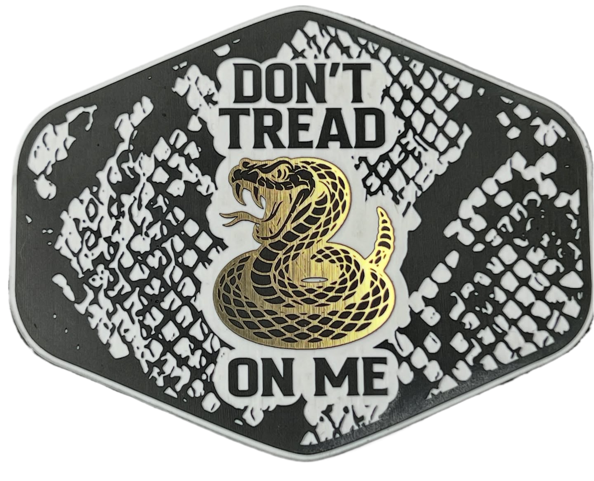 Black and white Don't Tread On Me snakeskin patch with white lettering and a gold coiled snake.
