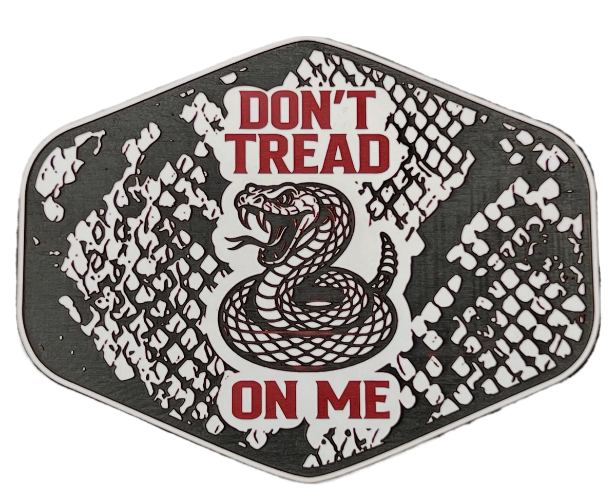 Black and white Don't Tread On Me snakeskin patch with red lettering and a coiled snake design.