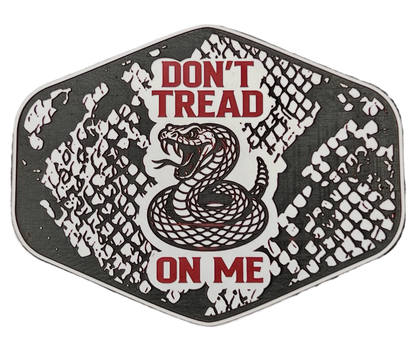 Black and white Don't Tread On Me snakeskin patch with red lettering and a coiled snake design.