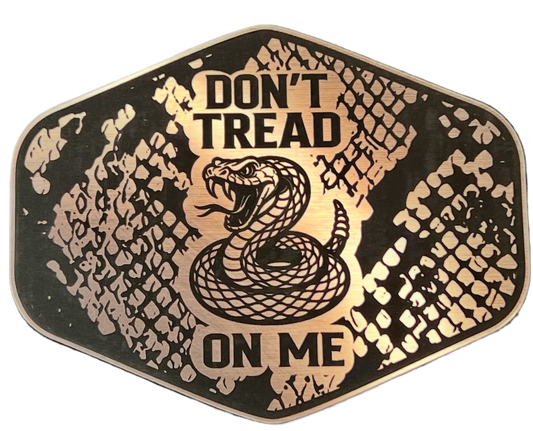 Copper Don't Tread On Me patch with a snakeskin background, coiled snake artwork, and shield shape.