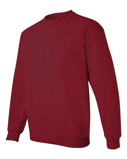 Gildan 18000 Heavy Blend crewneck sweatshirt in Cardinal Red, angled front view.