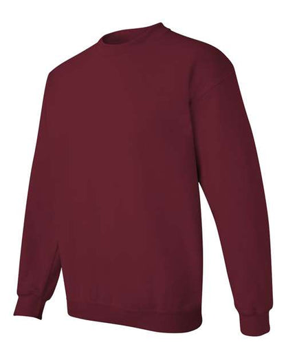 Gildan 18000 Heavy Blend crewneck sweatshirt in Garnet, angled front view.