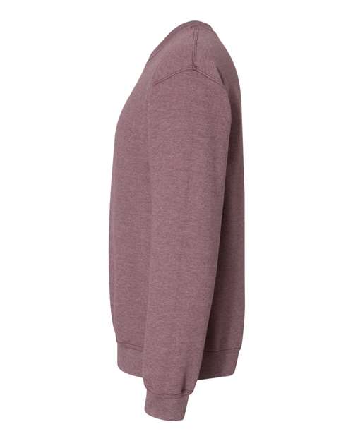 Gildan 18000 Heavy Blend crewneck sweatshirt in Heather Dark Maroon, side view showing the long sleeve and ribbed hem.