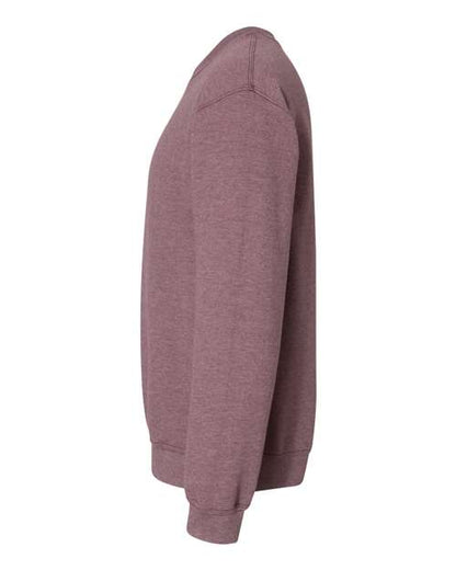 Gildan 18000 Heavy Blend crewneck sweatshirt in Heather Dark Maroon, side view showing the long sleeve and ribbed hem.