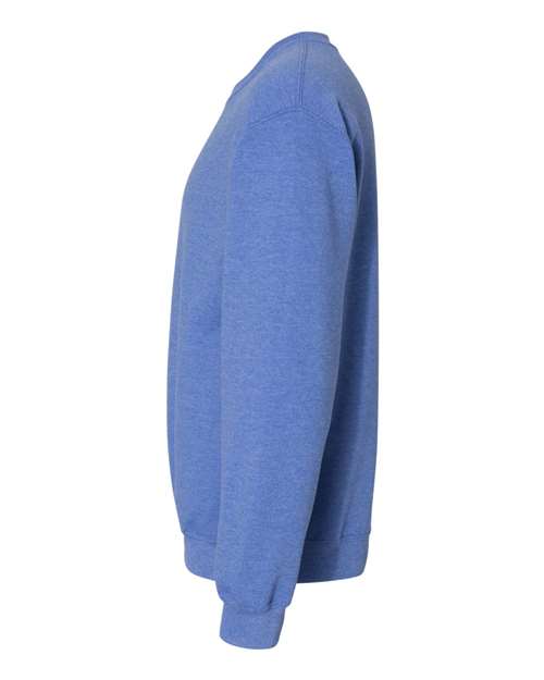 Gildan 18000 Heavy Blend crewneck sweatshirt in Heather Deep Royal, side view showing the long sleeve and ribbed hem.