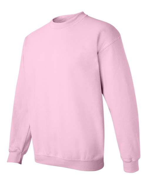 Gildan 18000 Heavy Blend crewneck sweatshirt in Light Pink, angled front view.