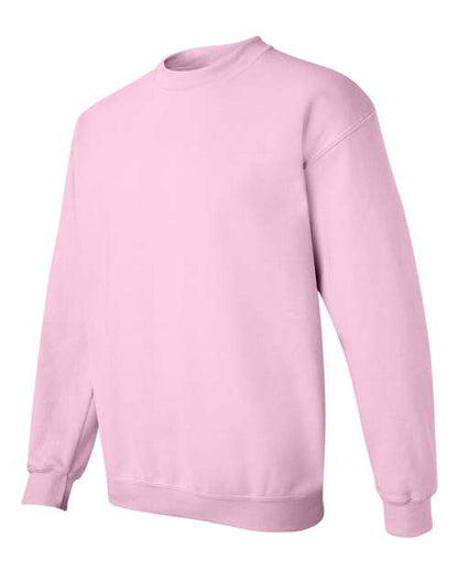Gildan 18000 Heavy Blend crewneck sweatshirt in Light Pink, angled front view.