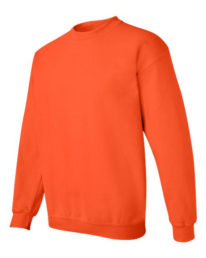 Gildan 18000 Heavy Blend crewneck sweatshirt in Orange, side view showing the long sleeve and ribbed hem.