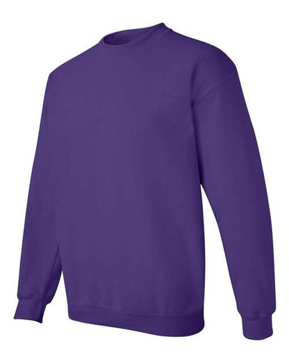 Gildan 18000 Heavy Blend crewneck sweatshirt in Purple, angled front view.
