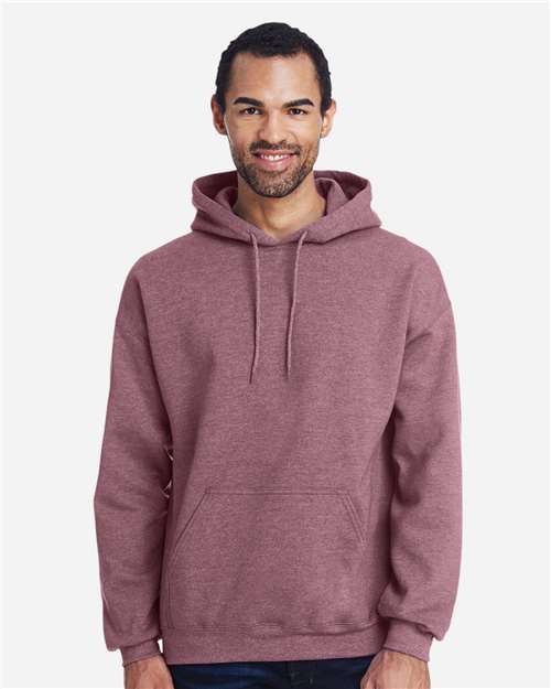 Gildan 18500 Heavy Blend pullover hoodie in Heather Dark Maroon, front on model view.