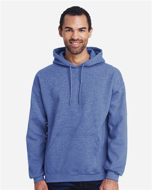 Gildan 18500 Heavy Blend pullover hoodie in Heather Deep Royal, front on model view.