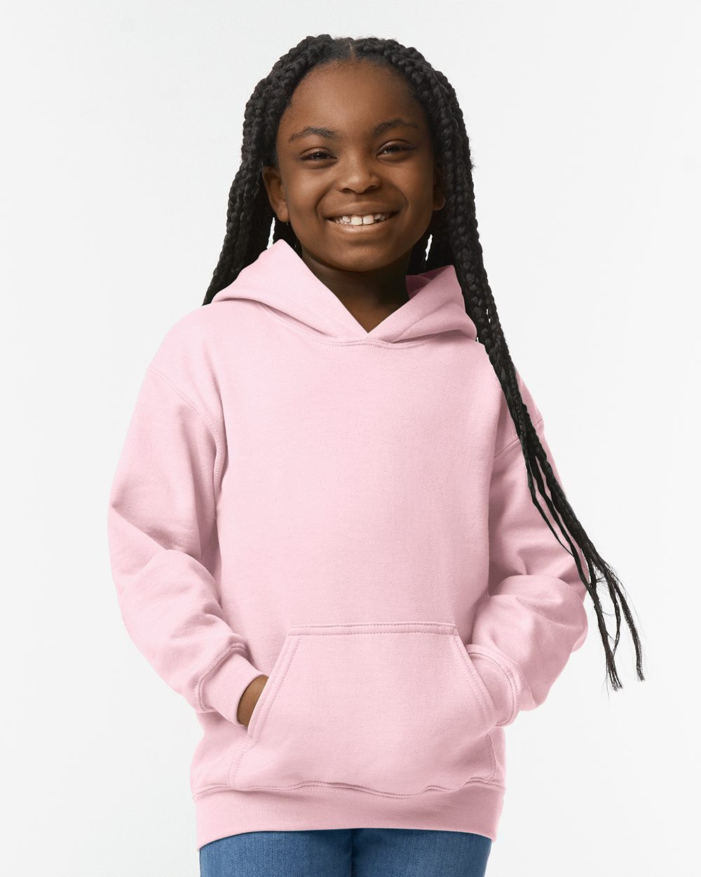 Model wearing a Gildan 18500B Heavy Blend youth pullover hoodie in Light Pink, front lifestyle view.