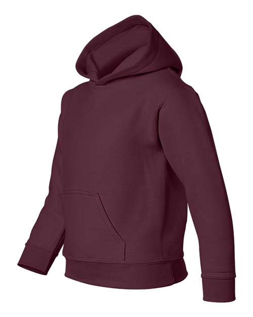 Gildan 18500B Heavy Blend youth pullover hoodie in Maroon, angled front view showing the hood and front pocket.