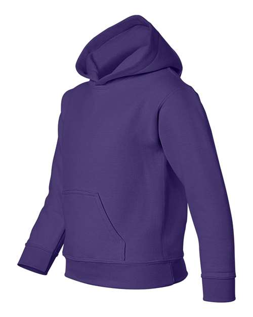 Gildan 18500B Heavy Blend youth pullover hoodie in Purple, angled front view showing the hood and front pocket.