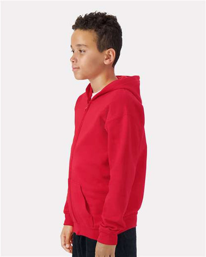Model wearing a Gildan 18600B Heavy Blend youth full-zip hoodie in Red, side view.