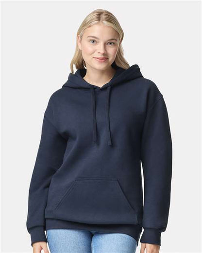 Model wearing a Gildan 19500 Maxweight Blend pullover hoodie in Blue Dusk, front view.
