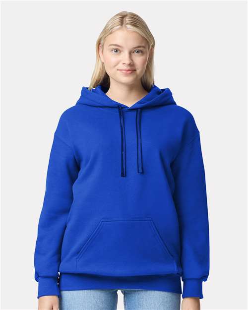 Model wearing a Gildan 19500 Maxweight Blend pullover hoodie in Deep Royal, front view.