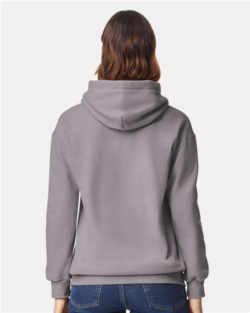 Model wearing a Gildan 19500 Maxweight Blend pullover hoodie in Gravel, back view.