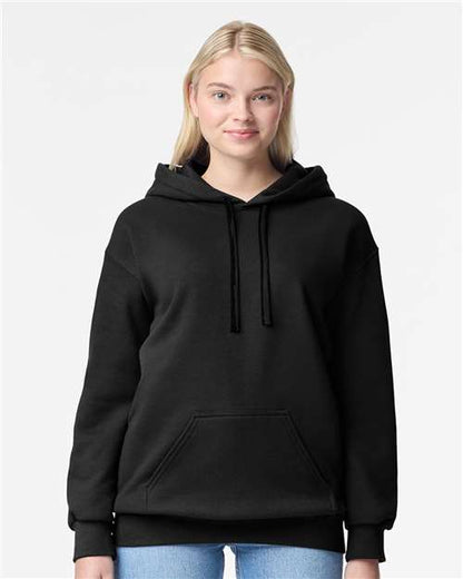 Model wearing a Gildan 19500 Maxweight Blend pullover hoodie in Pitch Black, front view.