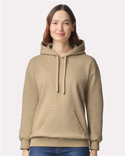 Model wearing a Gildan 19500 Maxweight Blend pullover hoodie in Tan, front view.