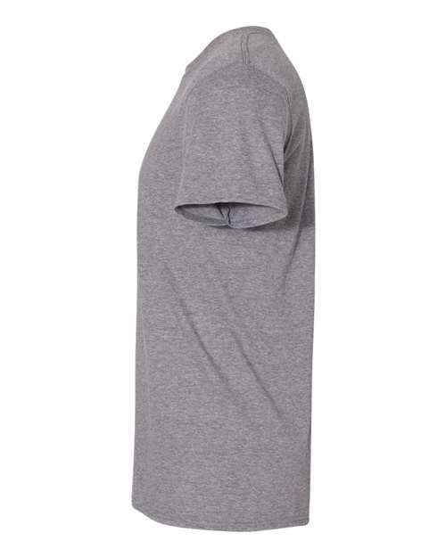 Gildan 64000 Softstyle T-shirt in Graphite Heather, side view showing the short sleeve and hem.
