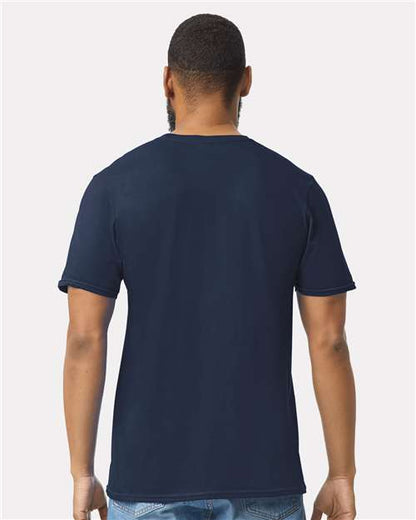 Model wearing a Gildan 64000 Softstyle T-shirt in Navy, back view.