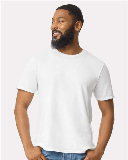 Model wearing a Gildan 64000 Softstyle T-shirt in White, front view.