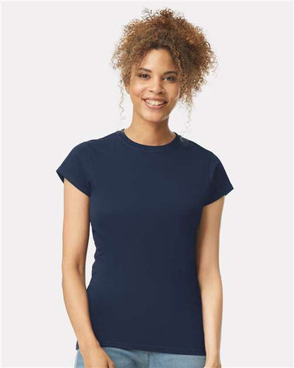 Model wearing a Gildan 64000L Softstyle women's T-shirt in Navy, front view.