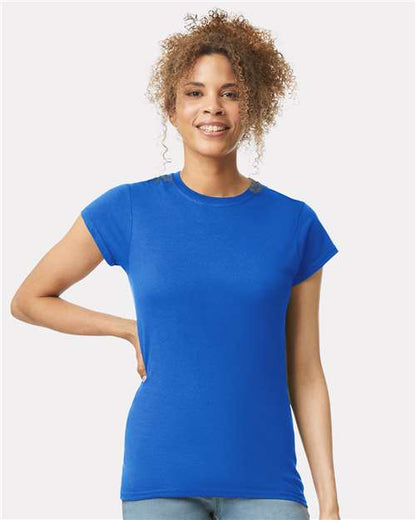 Model wearing a Gildan 64000L Softstyle women's T-shirt in Royal, front view.
