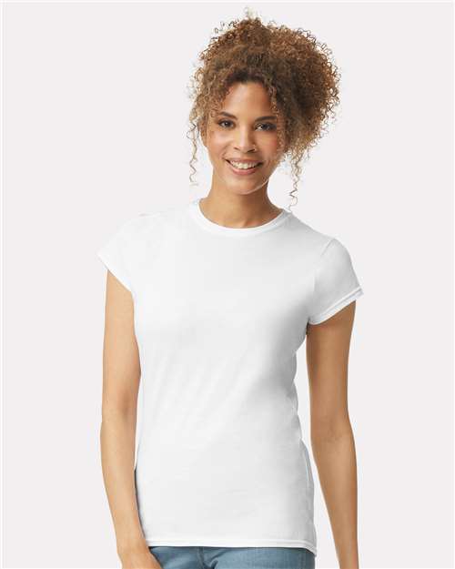 Model wearing a Gildan 64000L Softstyle women's T-shirt in White, front view.