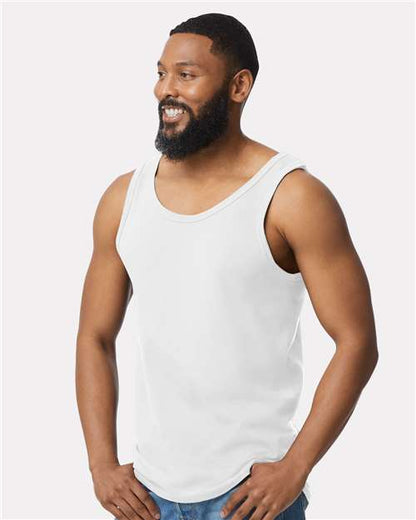 Model wearing a Gildan 64200 Softstyle men's tank top in White, side view.