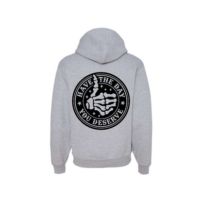 Athletic Heather Have the Day You Deserve graphic hoodie, back view showing the circular skeleton hand graphic.
