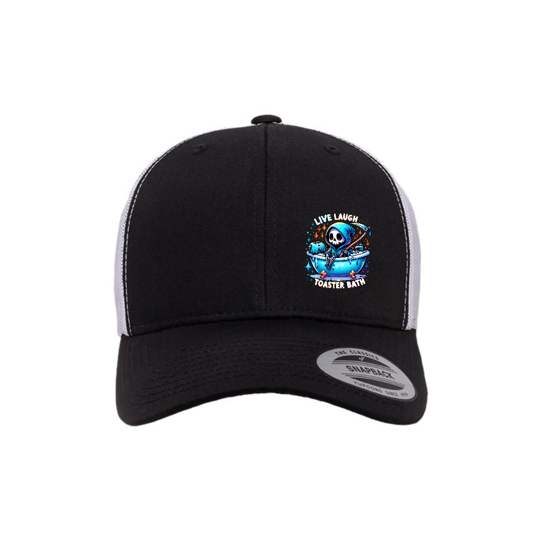 Live, Laugh, Toaster Bath 6-panel trucker hat in black with white mesh, front product mockup showing a colourful Grim Reaper bathtub patch.