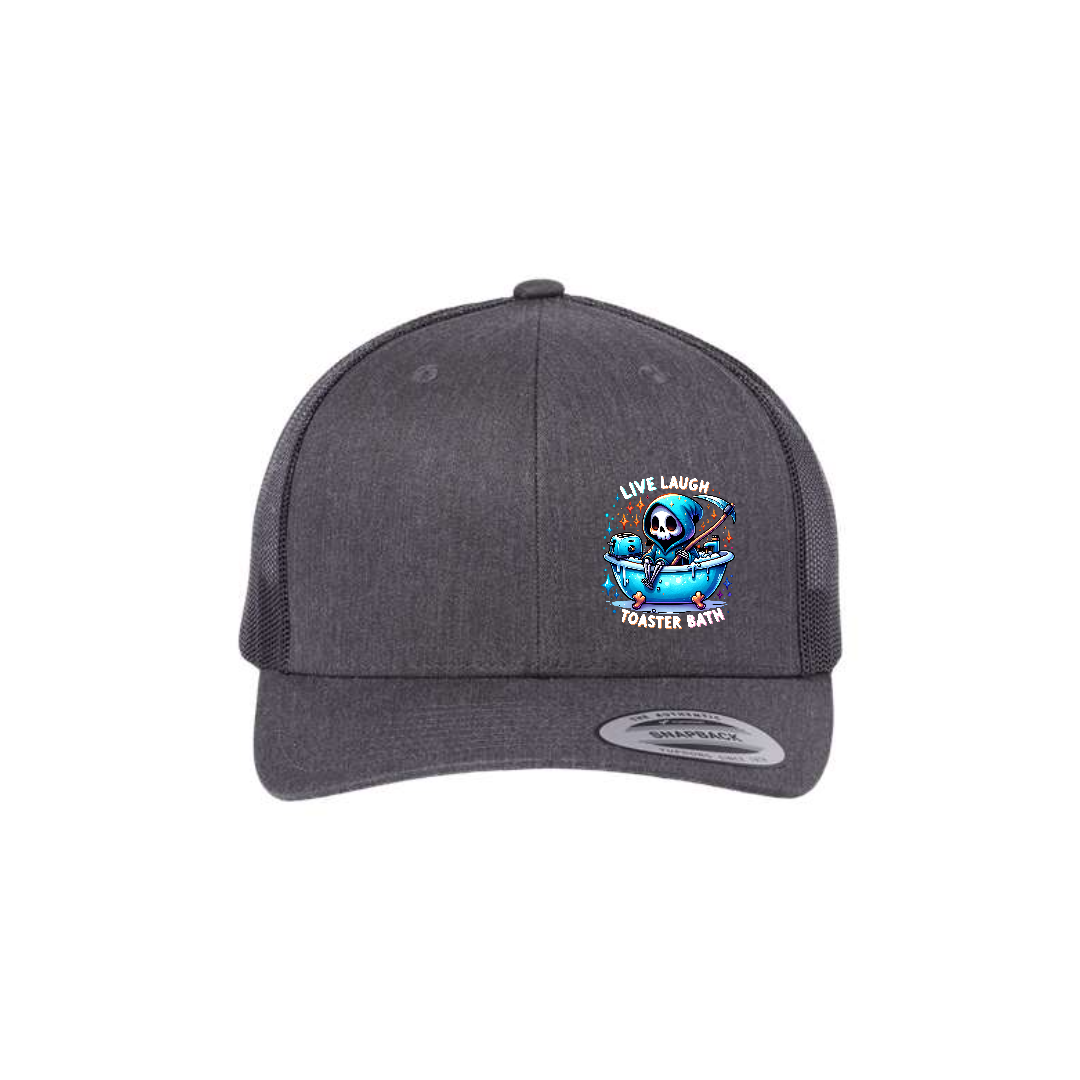 Live, Laugh, Toaster Bath 6-panel trucker hat in dark heather grey with black mesh, front product mockup showing a colourful Grim Reaper bathtub patch.