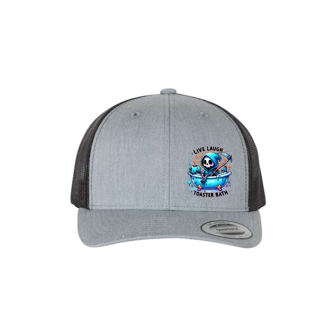 Live, Laugh, Toaster Bath 6-panel trucker hat in heather grey with black mesh, front product mockup showing a colourful Grim Reaper bathtub patch.