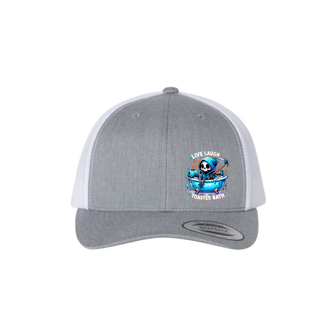 Live, Laugh, Toaster Bath 6-panel trucker hat in heather grey with white mesh, front product mockup showing a colourful Grim Reaper bathtub patch.