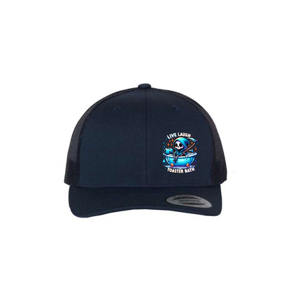 Live, Laugh, Toaster Bath 6-panel trucker hat in navy, front product mockup showing a colourful Grim Reaper bathtub patch.