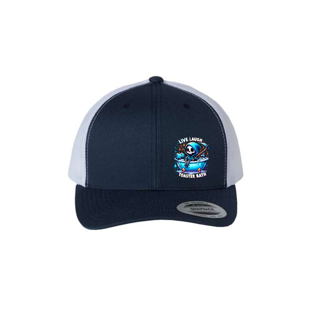 Live, Laugh, Toaster Bath 6-panel trucker hat in navy with white mesh, front product mockup showing a colourful Grim Reaper bathtub patch.