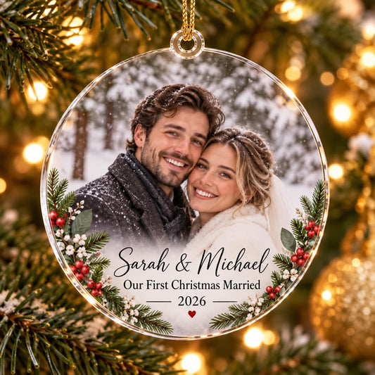 First Christmas married photo ornament with a couple's photo, Sarah and Michael names, greenery and 2026.