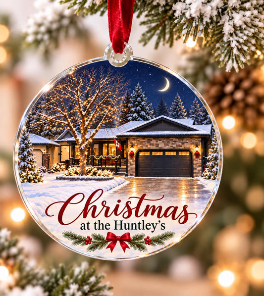 Personalized childhood home Christmas ornament with a snowy house, Christmas at the Huntley's wording and a red bow.
