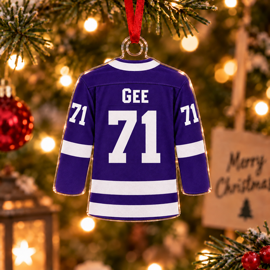 Purple hockey jersey Christmas ornament, back view showing GEE name lettering and number 71.
